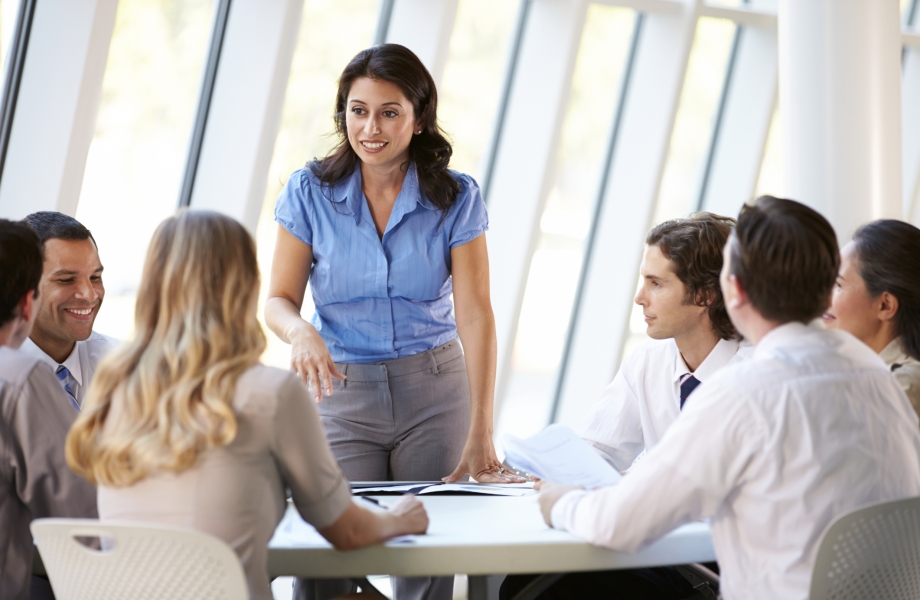 Business People Having Board Meeting In Office