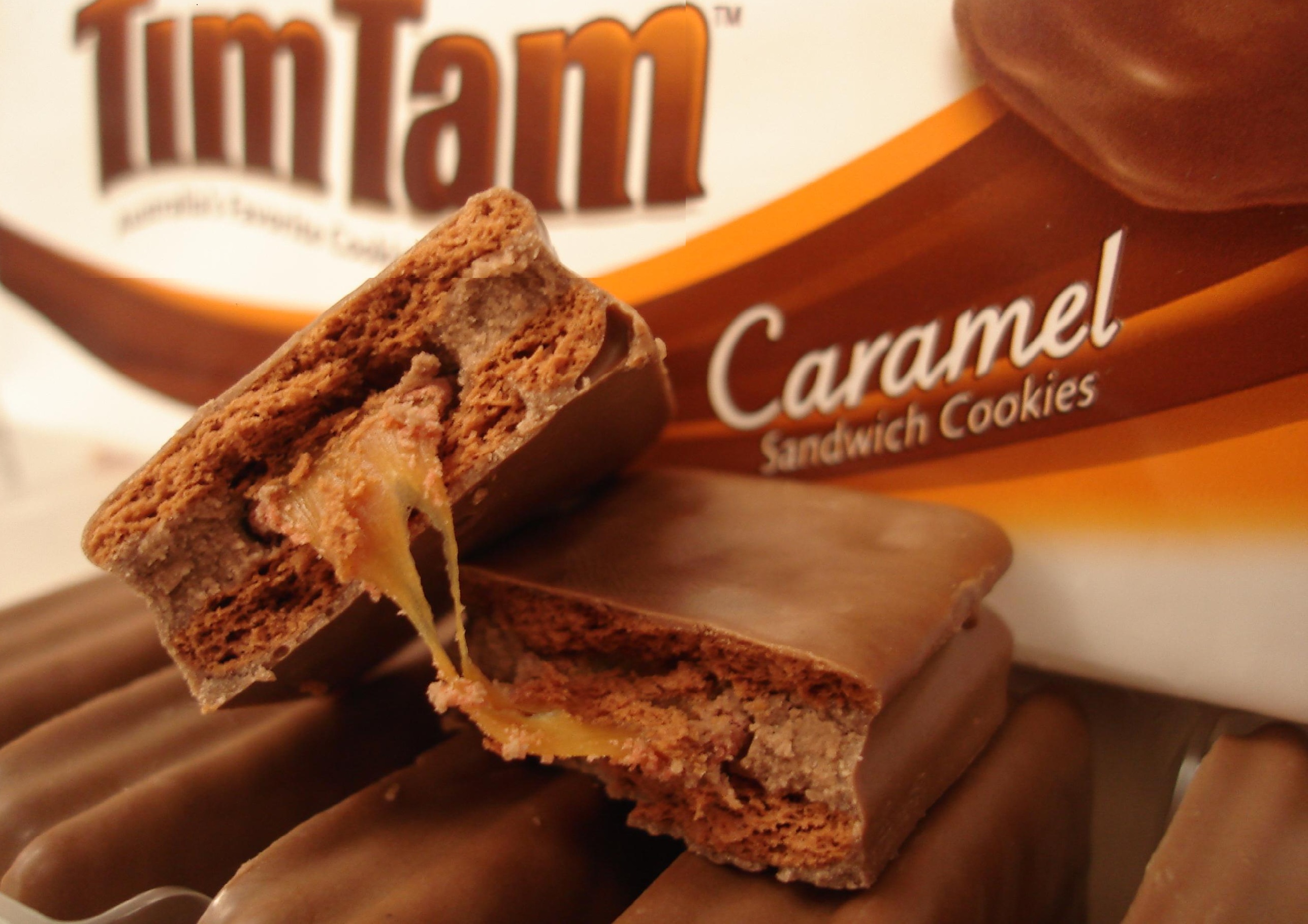 Tim Tams are chocolate covered caramel filled biscuits made in Australia Tim Tams are chocolate covered caramel filled biscuits made in Australia